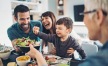 a family eating dinner together