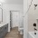 bathroom with a large mirror