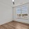 bedroom with a large window